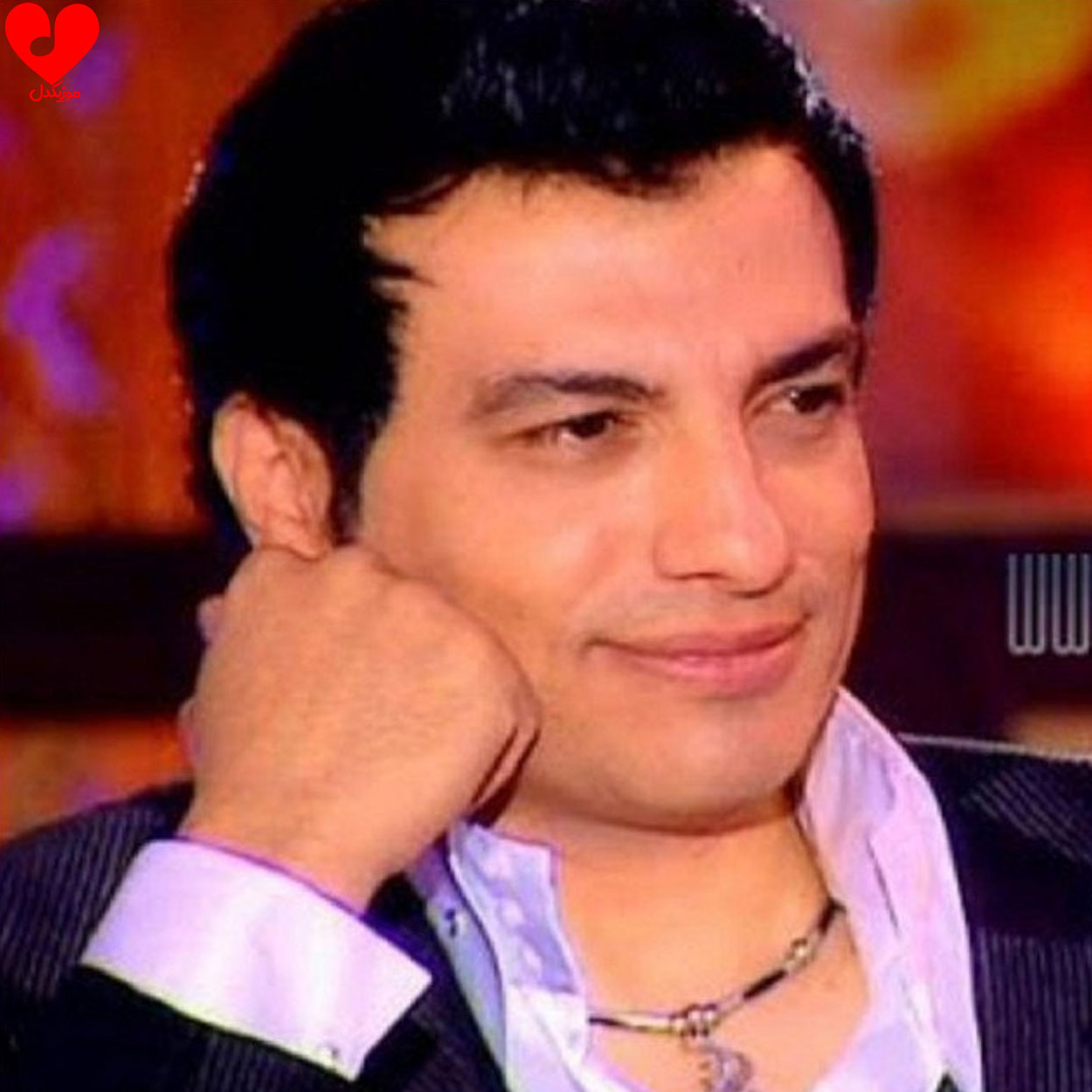فی حضنک